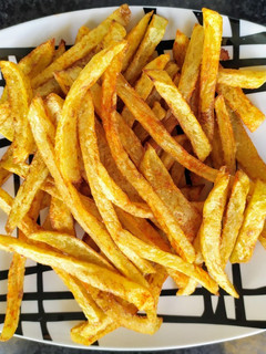 Una foto de Patatas fritas tipo taco-bell