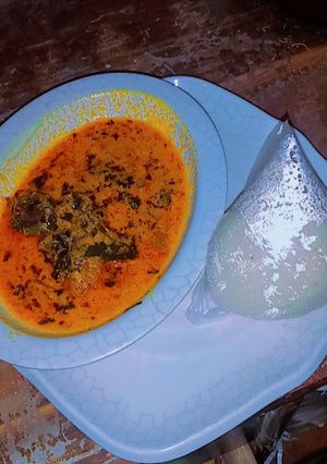 A picture of Tuwon couscous and egusi soup.