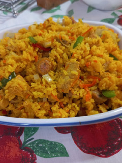 Una foto de Arroz apastelado con cerdo, pollo y chorizo