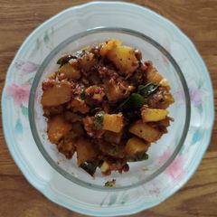 A picture of Yellow pumpkin Fenugreek seeds sprouts subji.