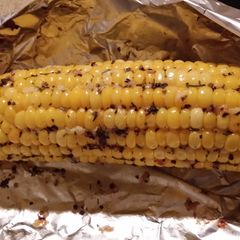 A picture of Baked buttered garlic corn.
