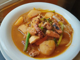 Estofado de pulpo con pepitona y pollo
