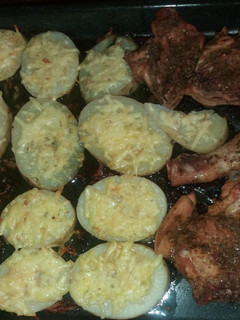 Una foto de Pollo y papas al horno