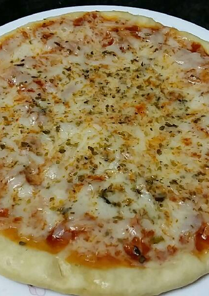 Una foto de Pizza crujiente en sartén 🍕