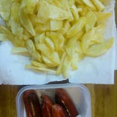 A picture of Fries with smokies.
