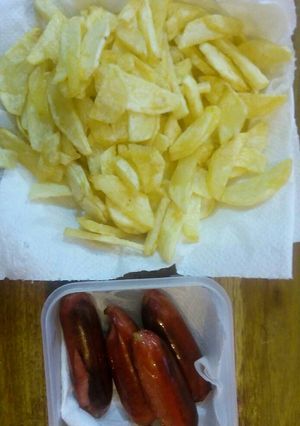 A picture of Fries with smokies.