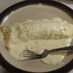 A picture of Jalapeno & Sausage stuffed Enchiladas in Alfredo Sauce.