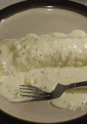 A picture of Jalapeno & Sausage stuffed Enchiladas in Alfredo Sauce.
