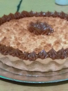 Una foto de Tarta de dulce de leche y coco