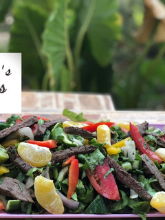 A picture of Thai beef and herbs salad.