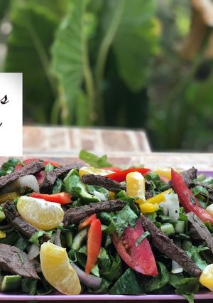 A picture of Thai beef and herbs salad.