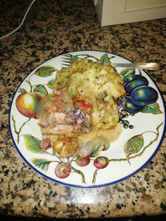 Una foto de Capas de pescado con cremoso relleno de mixto de mariscos