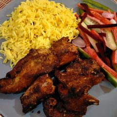A picture of Fish Fry with Rice.