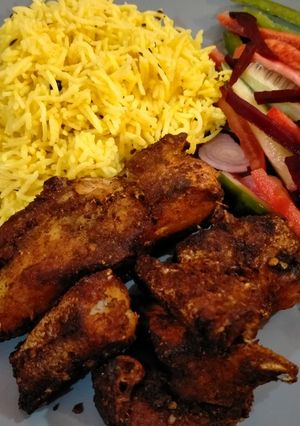 A picture of Fish Fry with Rice.