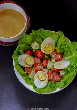 A picture of Salad with Ranch dressing.