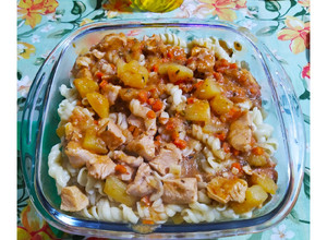 Una foto de Fideo tirabuzón con tuco de Pollo
