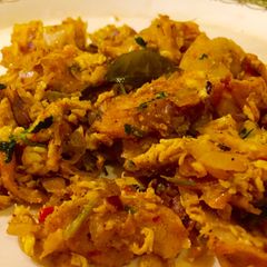 A picture of Malabar kothu parotta (Egg minced bread).