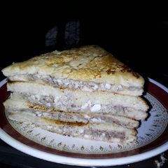 A picture of Egg and sardine sandwich.