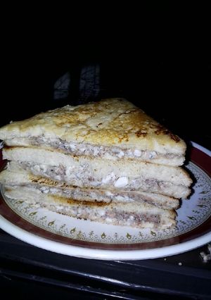 A picture of Egg and sardine sandwich.