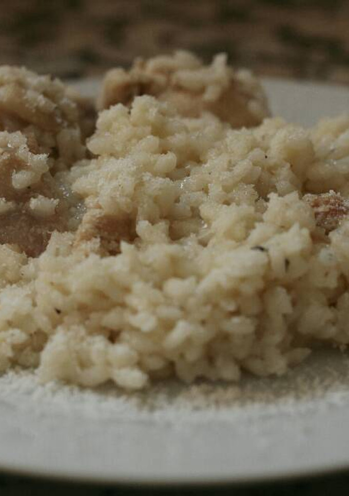 Una foto de Arroz cremoso con Grana Padano y pollo 🌹🍚🌹