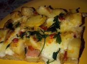 Una foto de tortilla de papa rellena