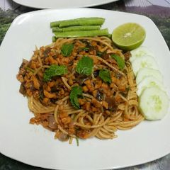 A picture of Thai Style LARB Spaghetti with Mushroom and Sausages.