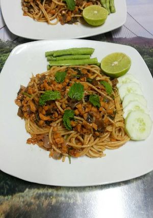 A picture of Thai Style LARB Spaghetti with Mushroom and Sausages.
