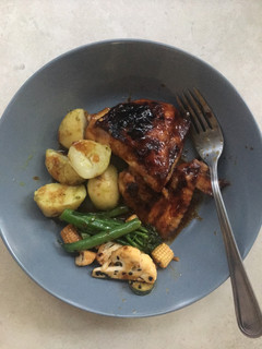 A picture of Sticky hoisin roast chicken with flash fried vegetables.