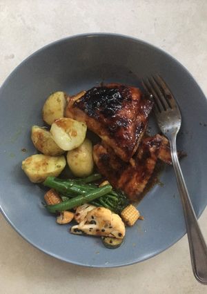 A picture of Sticky hoisin roast chicken with flash fried vegetables.