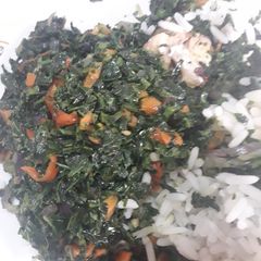 A picture of Vegetable sauce and white rice.