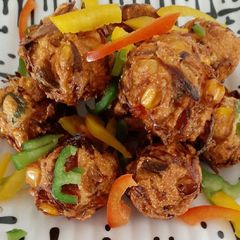 A picture of Tricolour capsicum bhajiya from leftover vada batter.