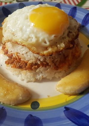 Una foto de Arroz tapado