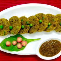 Spinach, peas & carrot idli A picture of Spinach, peas & carrot idli.