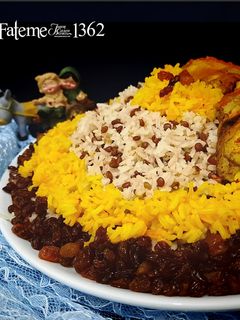 عکسی از دستور عدس پلو با مرغ و کشمش