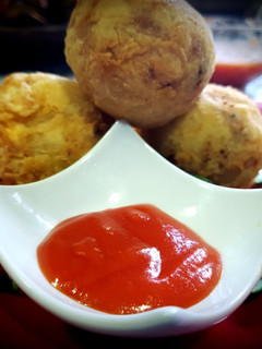 Una foto de Papas rellenas o bombas de patata
