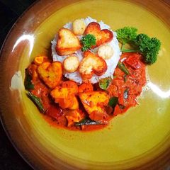 A picture of Paneer masala with coconut milk.