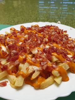 Una foto de Patatas bravas al estilo alcoreño