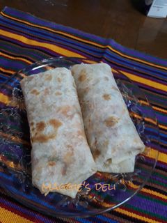 A picture of Egg Burritos with Everything.