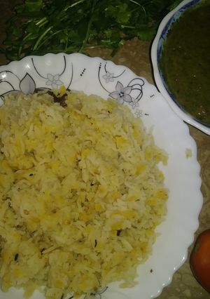 A picture of Khichri with chutney.