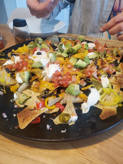 A picture of Loaded vegetarian nachos.