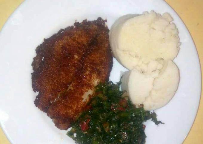 Deep fried fish with kales an Ugali