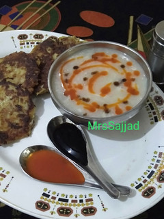 A picture of Corn Soup with Potato Fritters.
