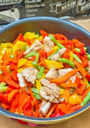 A picture of Stir-Fried Chicken Breast with Bell Peppers and Green Beans.