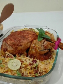 A picture of Lahori Chargha with Masala Rice.