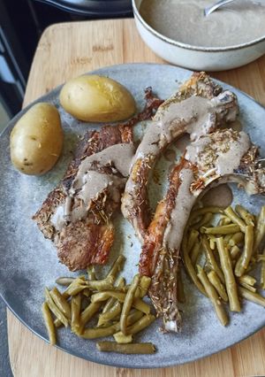 A picture of Lamb Chops with Black Garlic Sauce.