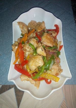 A picture of Spicy honey chicken stir-fry.