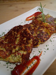 Una foto de Torticas de calabacín y patatas