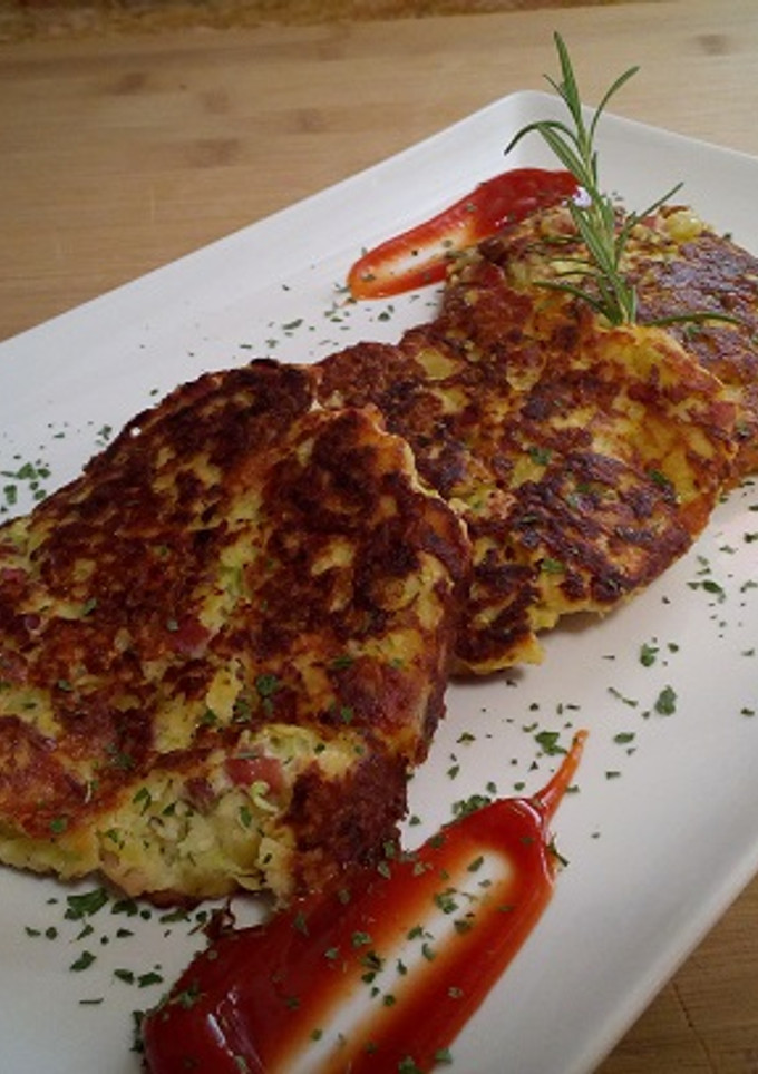 Una foto de Torticas de calabacín y patatas