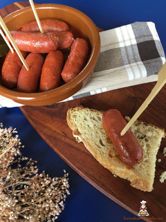 Una foto de Chorizos al vino