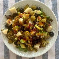 A picture of Summer salad with broccoli and jamón serrano.